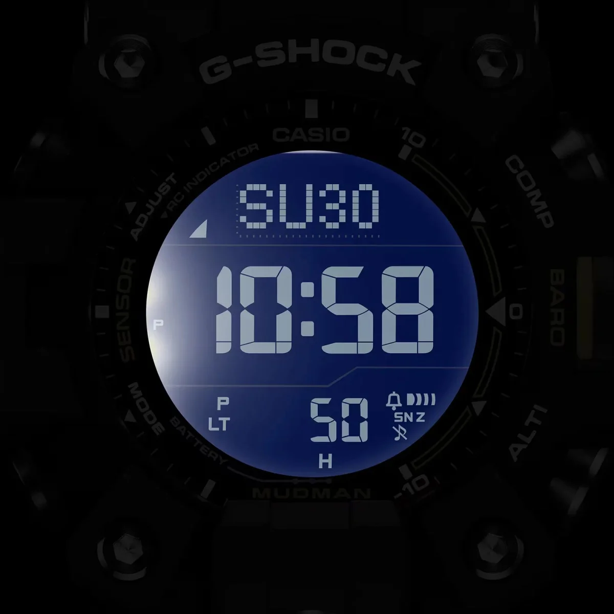 Casio G-Shock Mudman digital watch face with a backlit blue display showing the time as 10:58 and the date as Sunday 30.