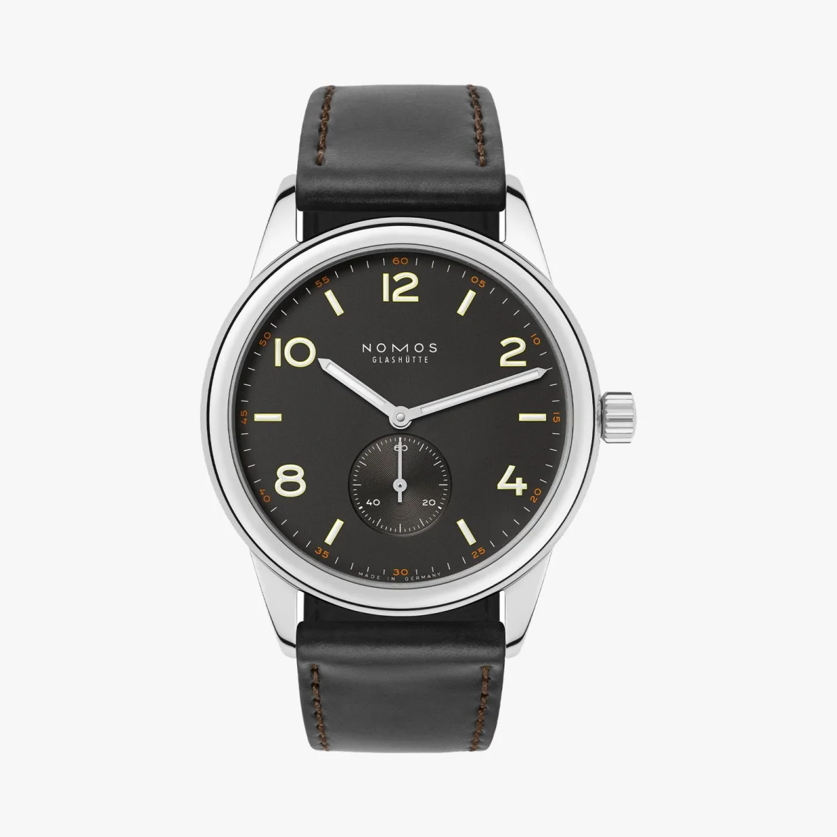 NOMOS Glashütte watch with a black dial, silver hands, Arabic numerals, and a dark brown leather strap.