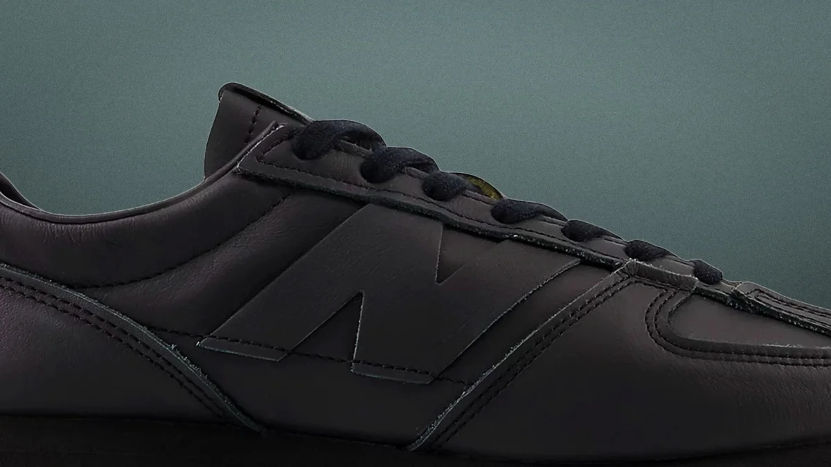 Black leather sneaker with black laces.