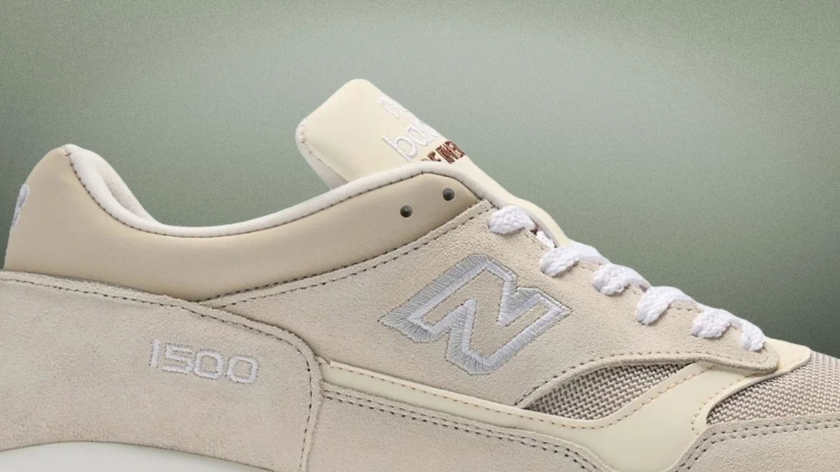 Beige New Balance 1500 sneaker with suede and mesh panels and white laces.