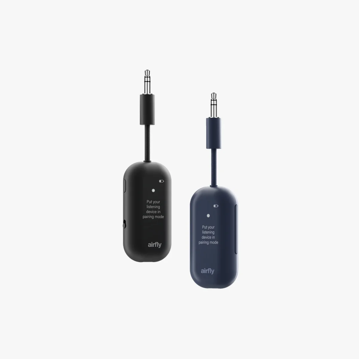 Two AirFly wireless audio transmitters in black and navy blue, each featuring a 3.5mm plug and text on the face reading, Put your listening device in pairing mode.