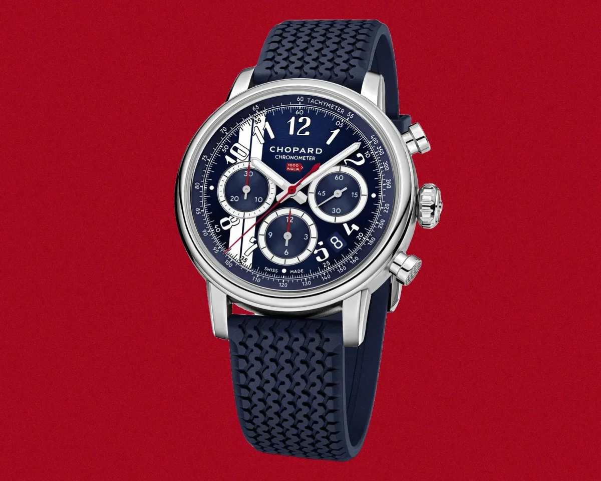 Chopard Mille Miglia chronograph watch featuring a blue dial with three sub-dials and a blue rubber strap with a tire-tread pattern.