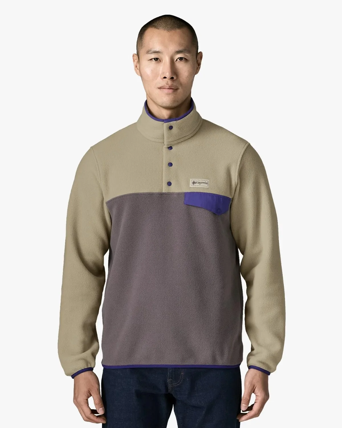 Patagonia snap-T fleece pullover in tan and grey featuring purple trim and a chest pocket.