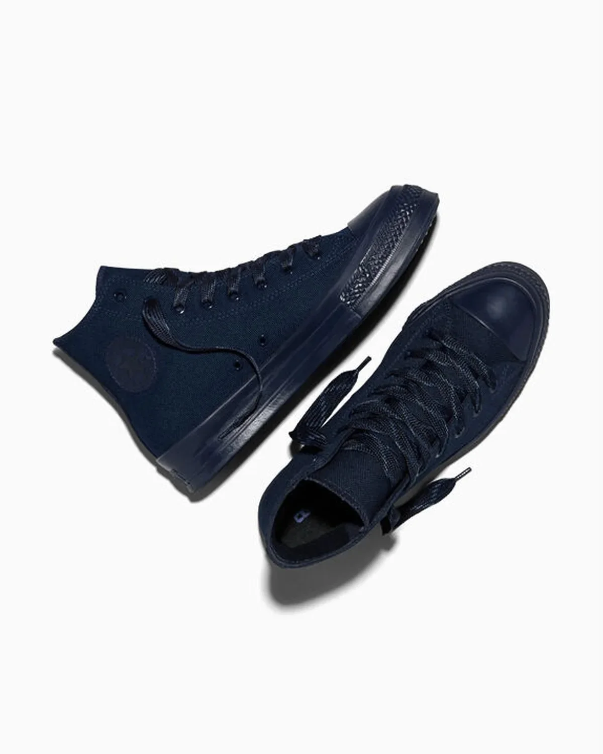 Navy blue high-top canvas sneakers featuring matching navy blue laces and soles.