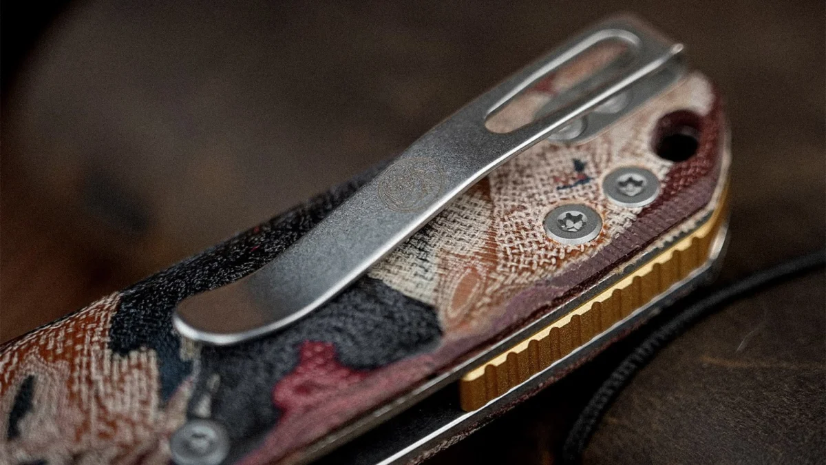 Vosteed Psyop button-lock knife with Current Micarta handle