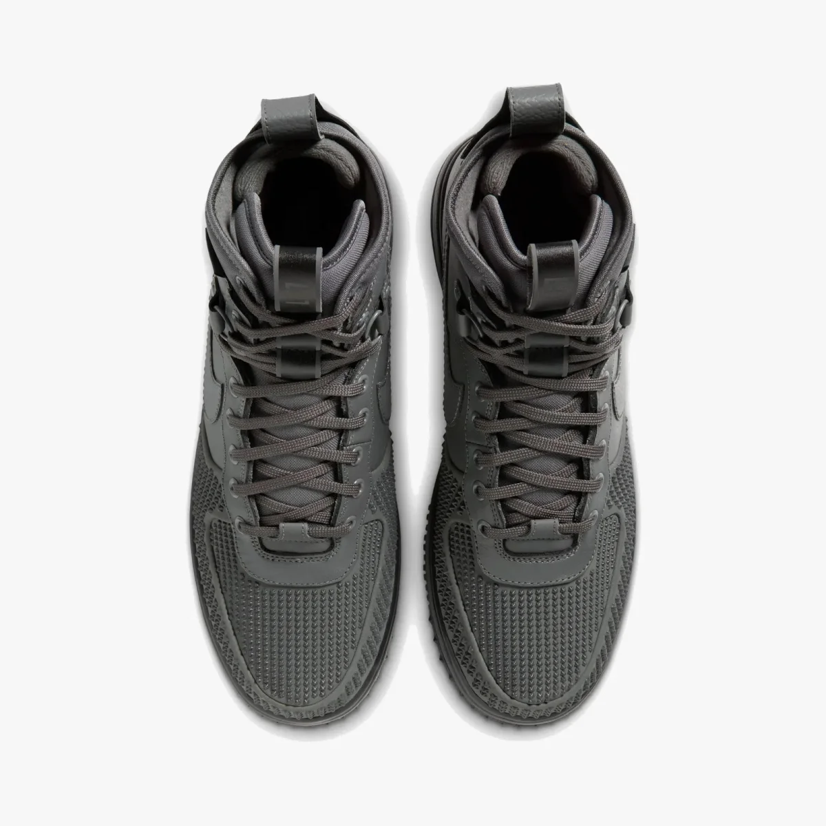 Top-down view of grey high-top sneakers featuring textured mesh toe boxes, matching laces, and heel pull tabs.