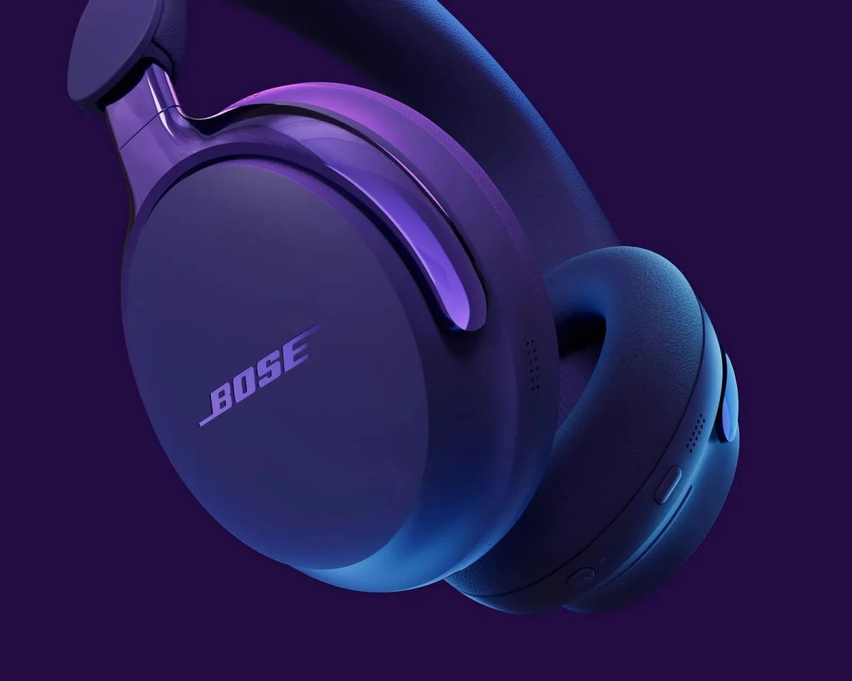 Bose over-ear headphones in a deep purple finish featuring the brand logo on the side.