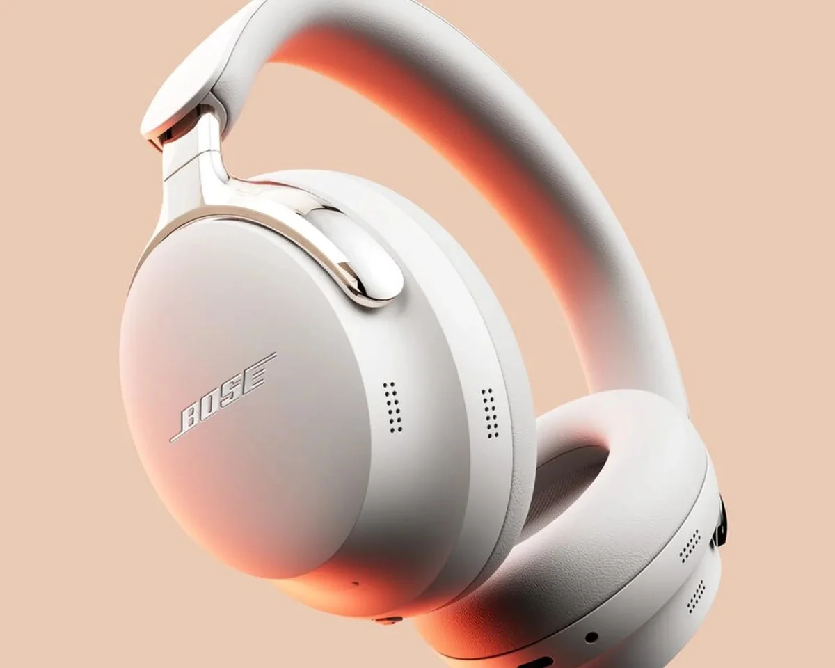 White Bose over-ear wireless headphones with metallic accents.
