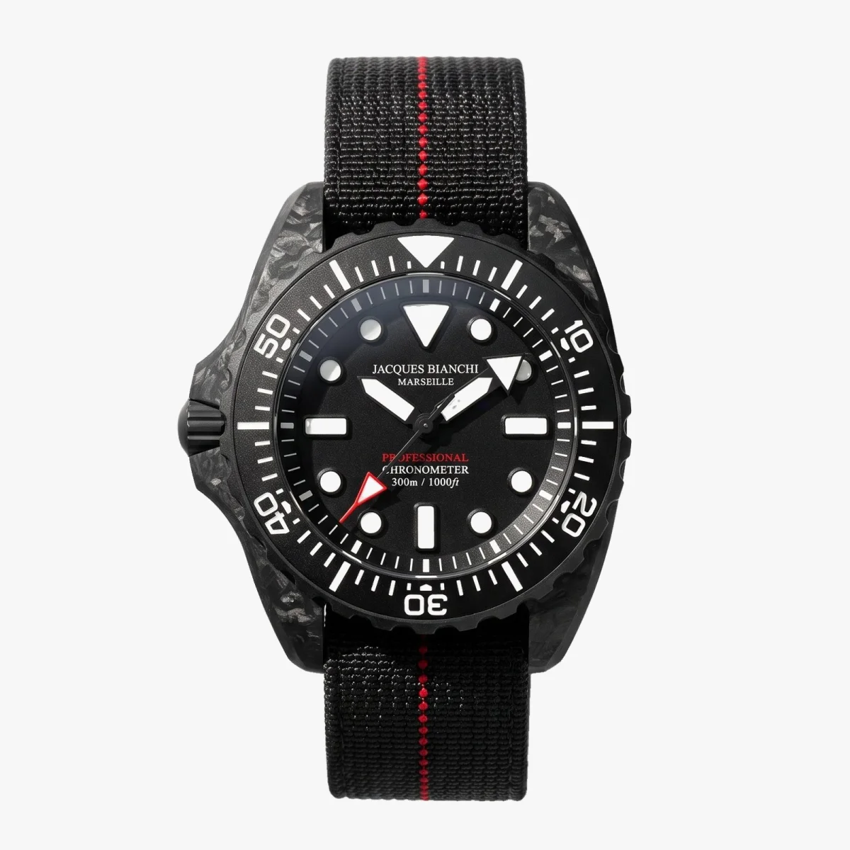 Jacques Bianchi Marseille professional diver’s watch featuring a black marbled case, black dial with luminous indices, and a black fabric strap with a red center stripe.