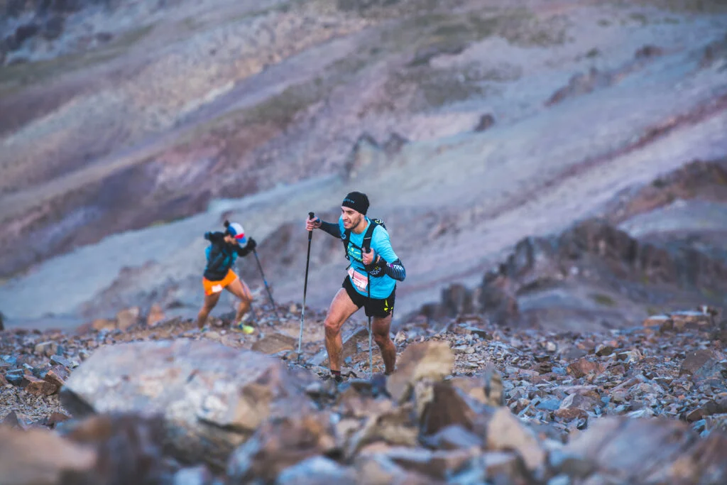 Ultrarunner climbing during 100 mile race preparation