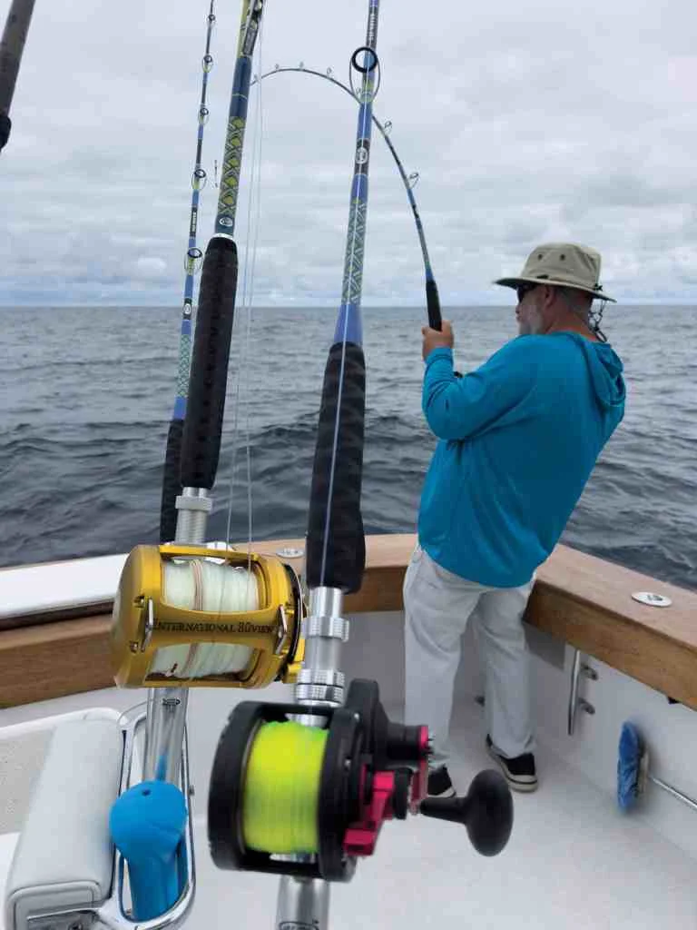 Angler fishing pitch bait