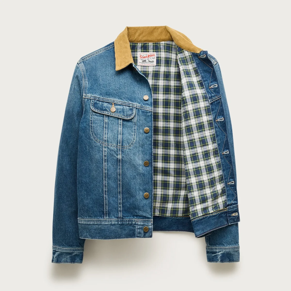 Blue denim jacket with tan corduroy collar and green plaid lining, partially open.