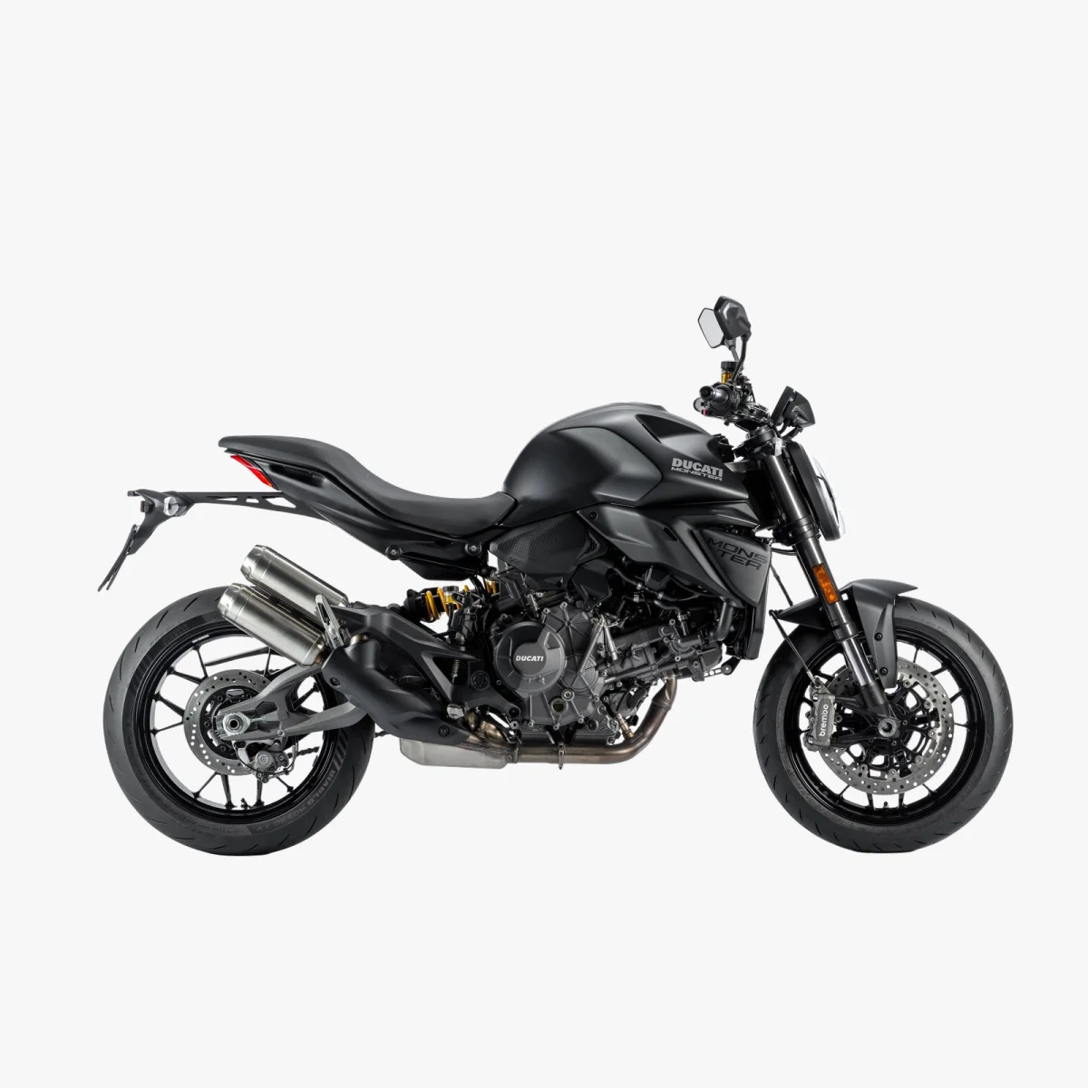 Matte black Ducati Monster motorcycle, shown in profile.