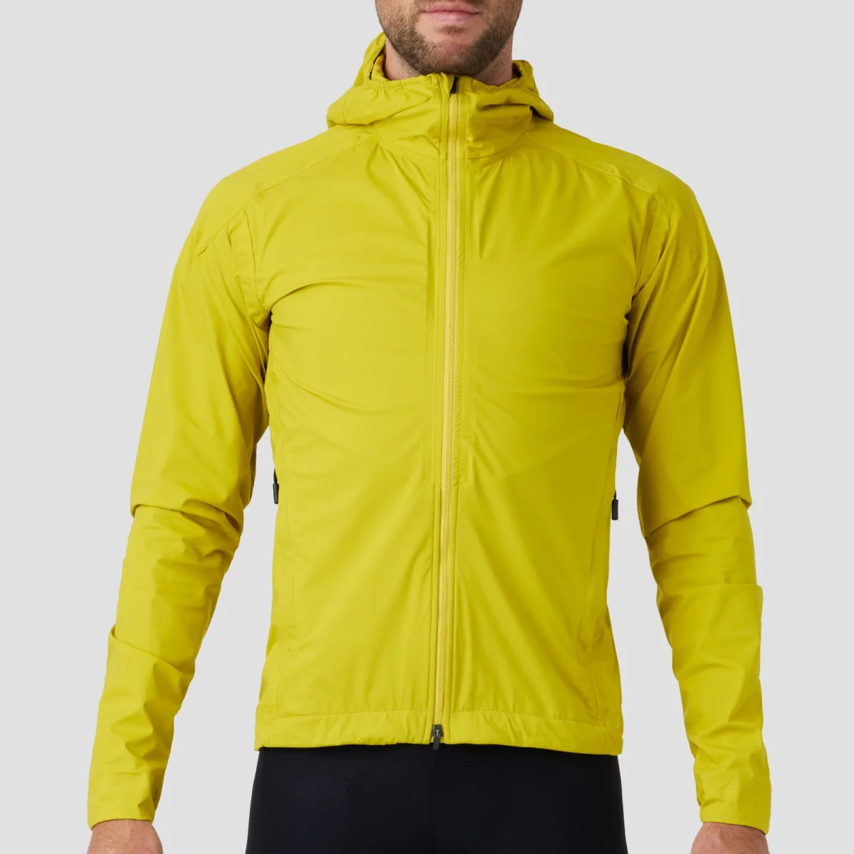 Chartreuse hooded windbreaker jacket with a full-length front zipper.