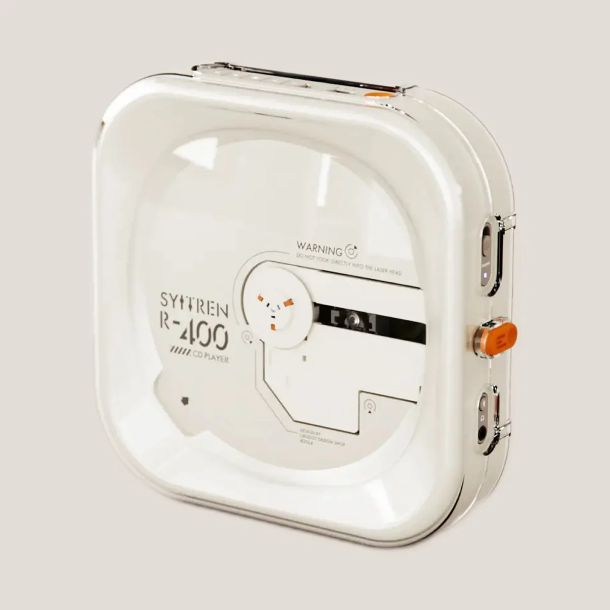 Square white portable CD player with a minimal design, labeled SYITREN R-400. Features visible side buttons and ports, and a transparent front cover revealing part of the disc compartment and some warning text.