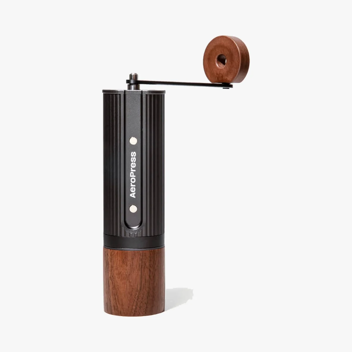 Manual coffee grinder with a black cylindrical body labeled AeroPress, wooden handle and base, on a plain white background.