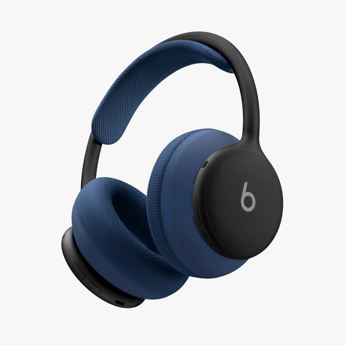 Blue and black over-ear wireless Beats headphones featuring a cushioned headband and ear pads, positioned against a plain white background.