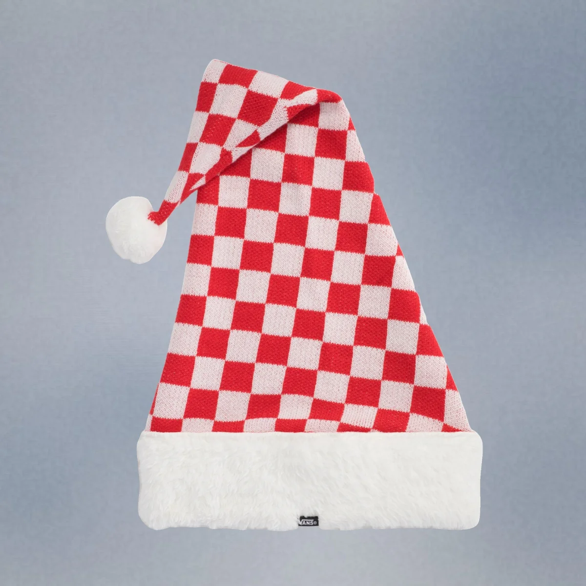 Red and white checkered knit Santa hat featuring a white faux fur trim and a small Vans logo tag.