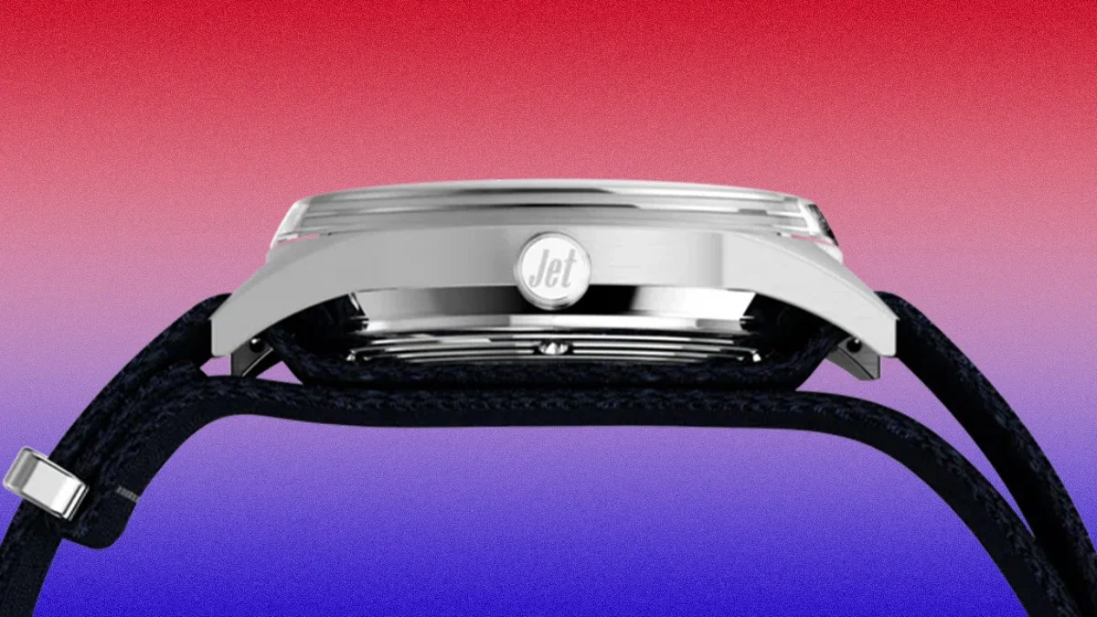 Side view of a silver watch case with